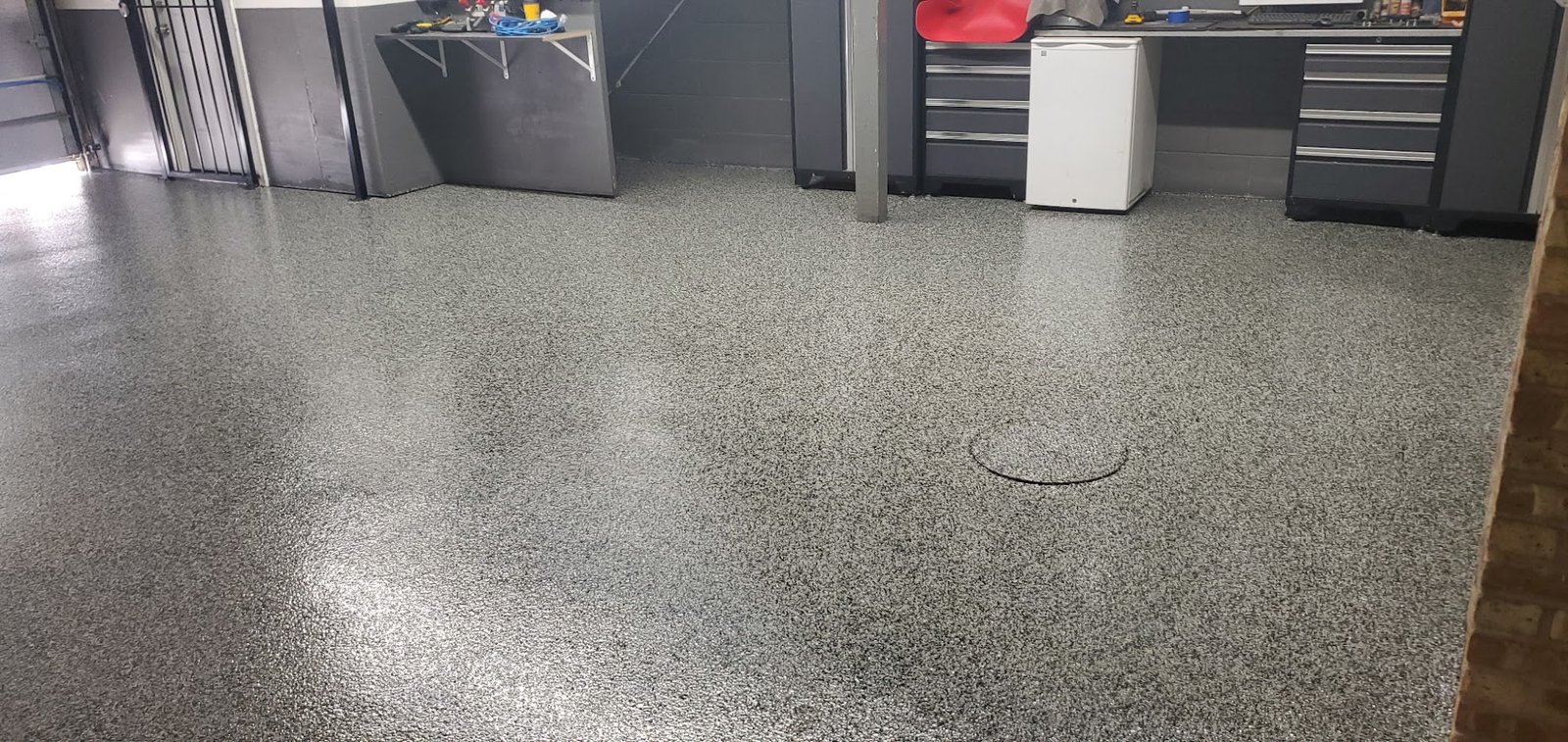 Flake epoxy garage floor installed by F&L Flooring